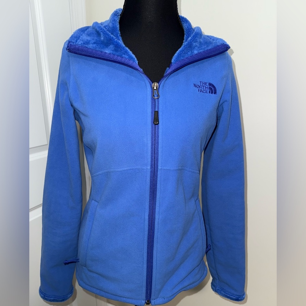The North Face blue, fuzzy, zip-up jacket